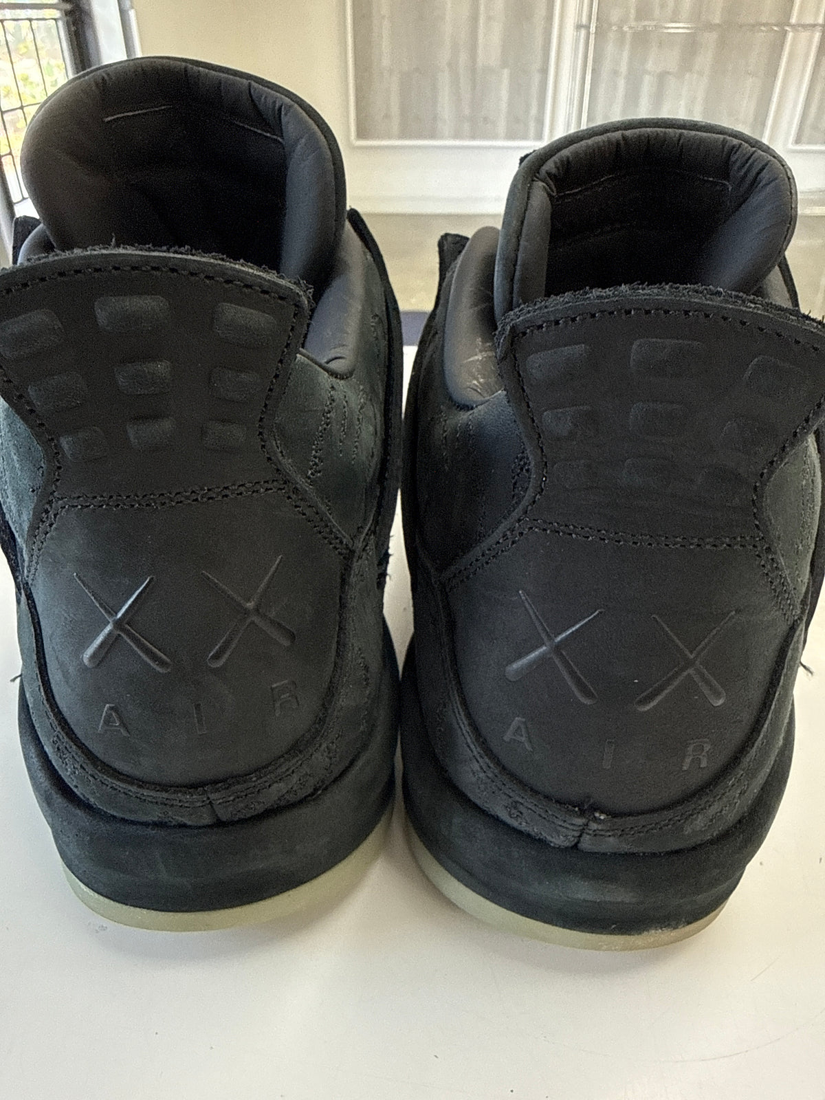 AIR JORDAN 4 KAWS BLACK - SIZE 12 (WORN)
