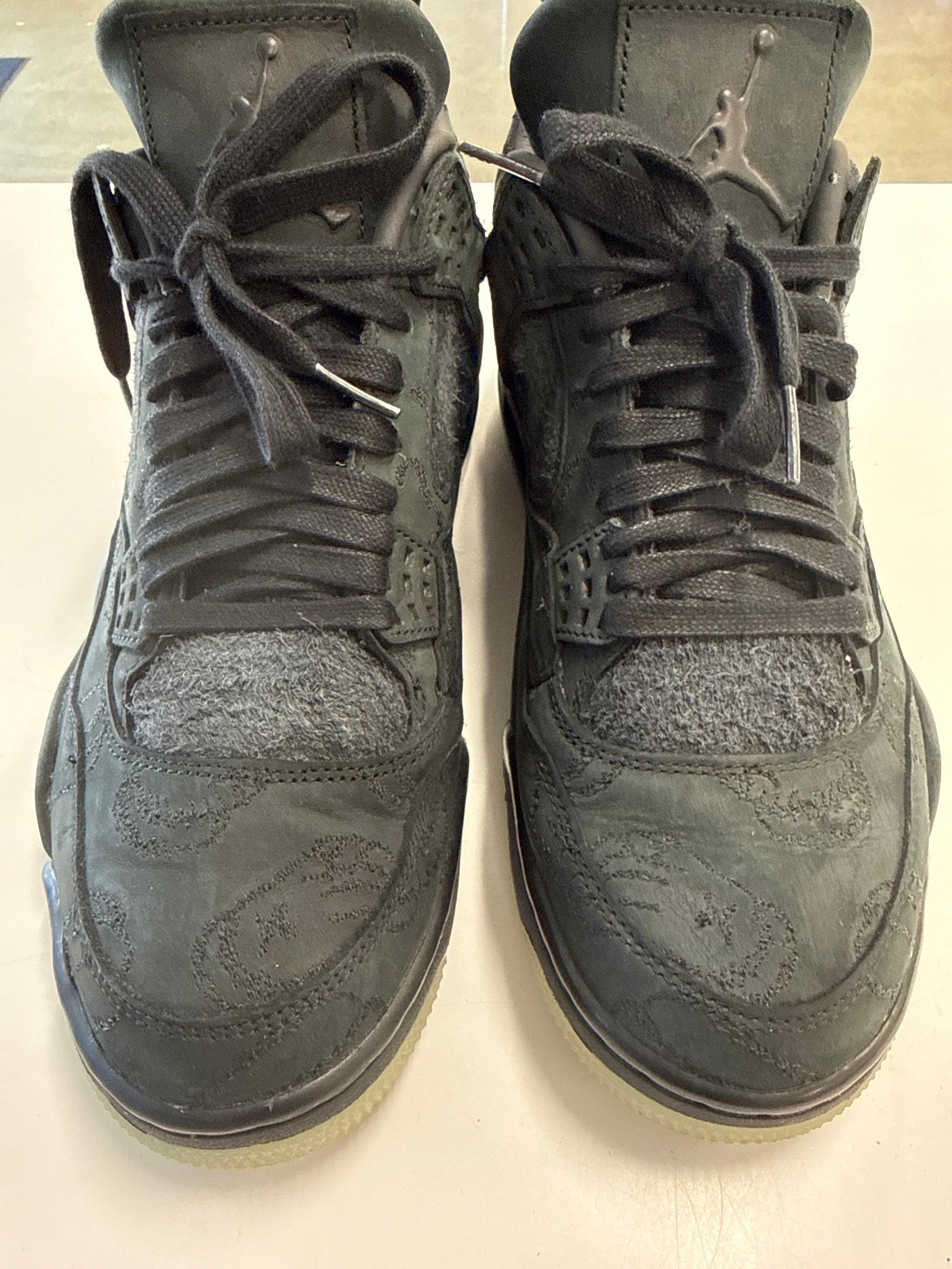 AIR JORDAN 4 KAWS BLACK - SIZE 10 (WORN)